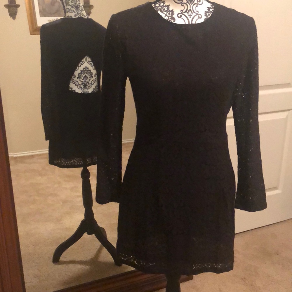 New/never worn black lace mini with open back